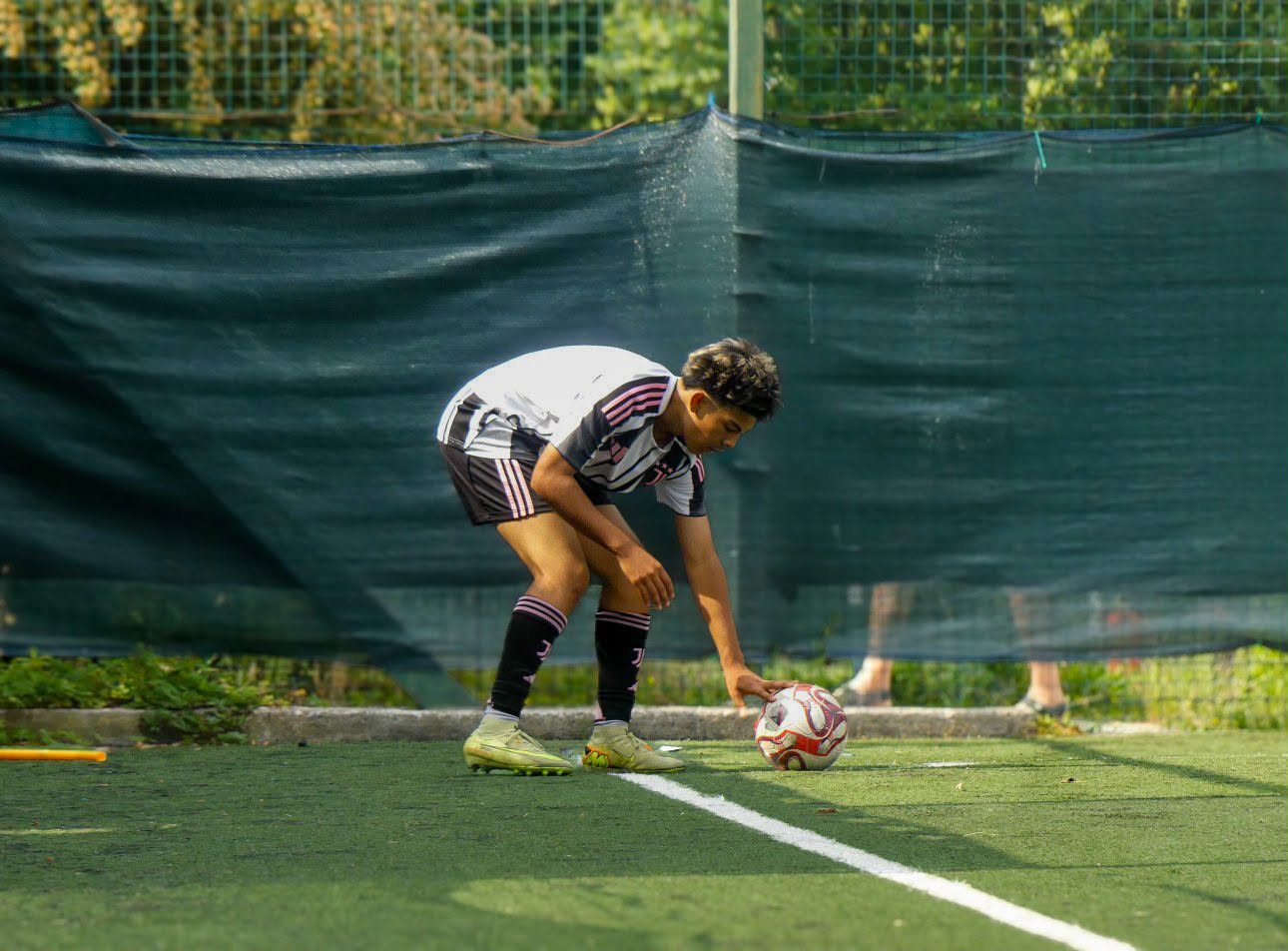 Eric placing the ball down before a set piece