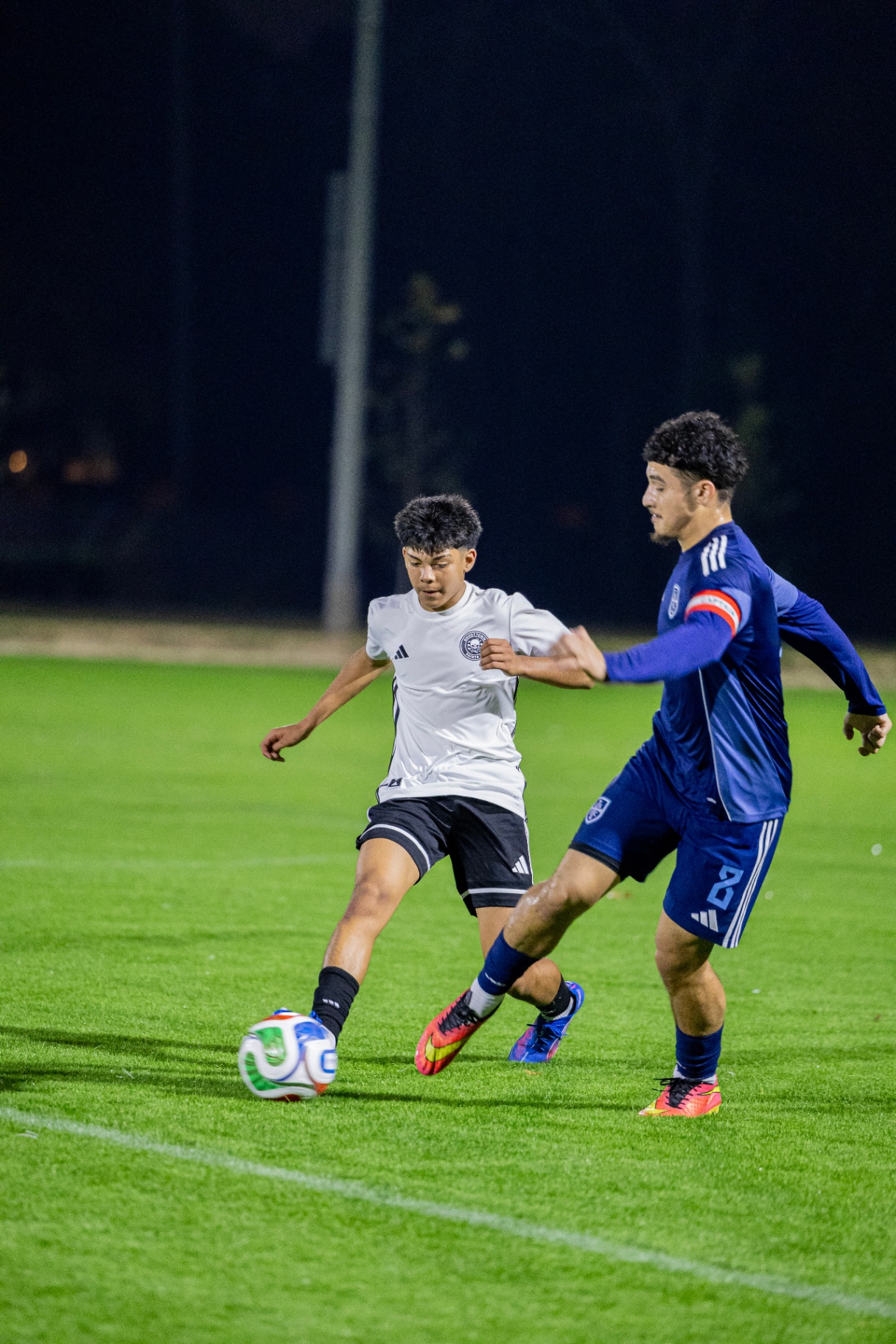Eric challenging a defender in Volt League