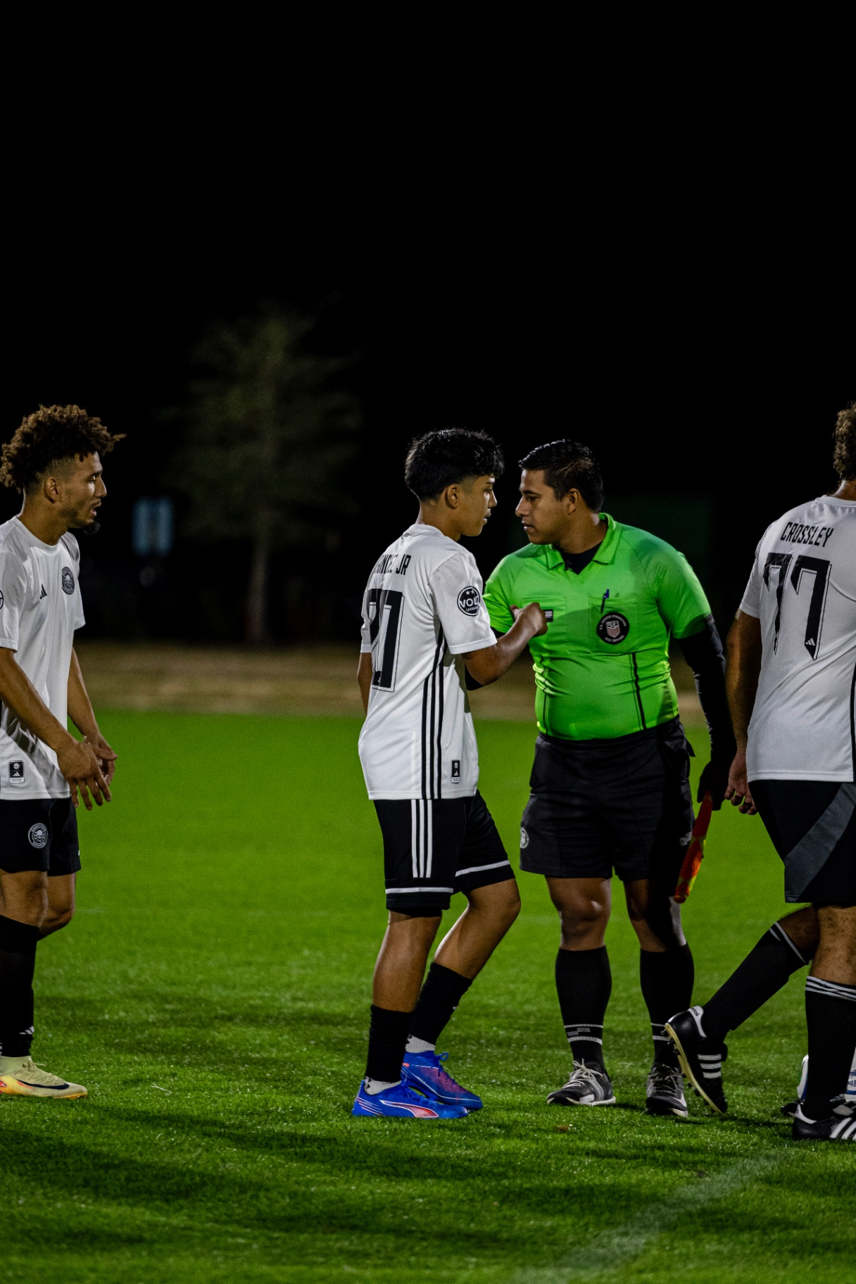 Eric speaking with the referee