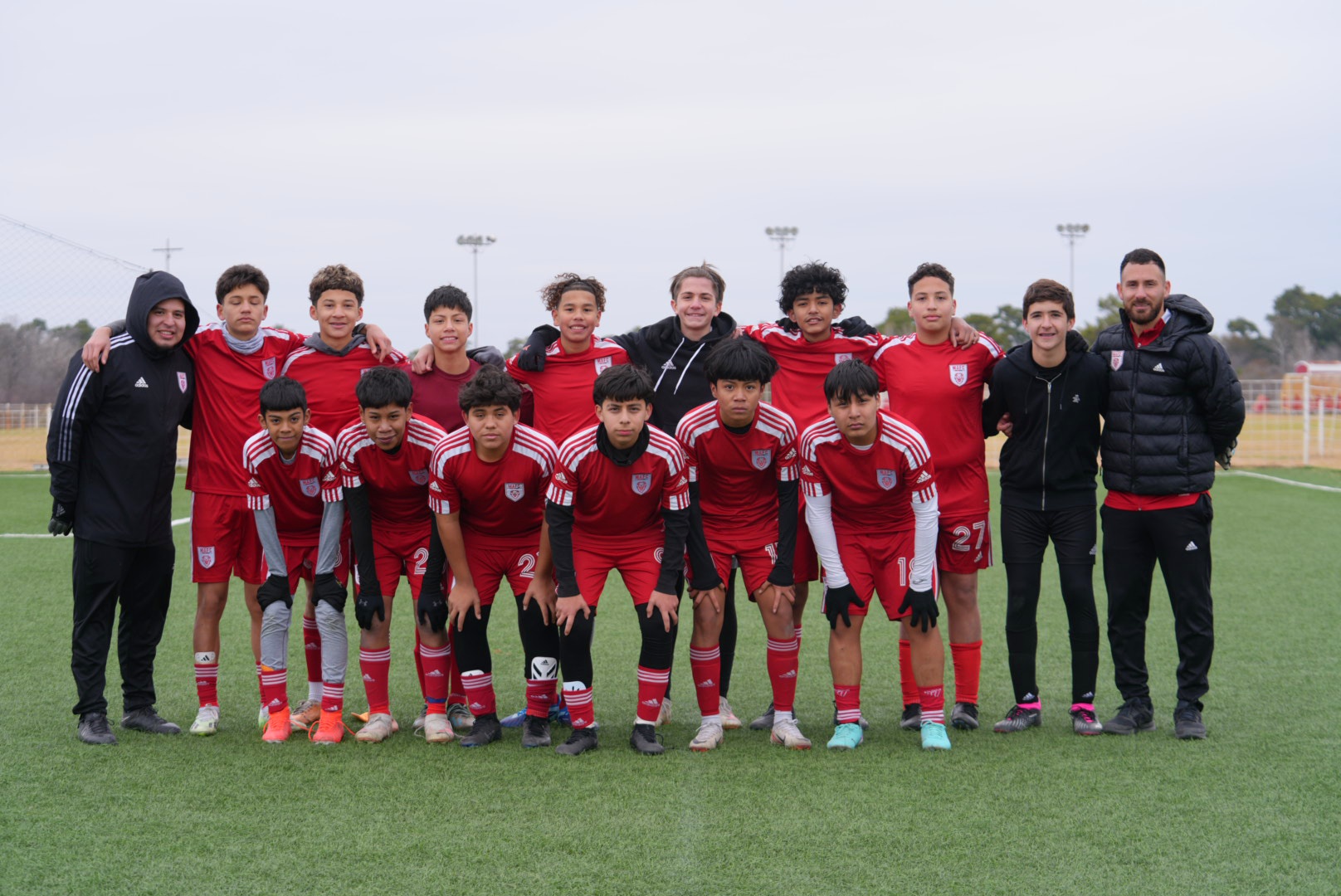MAFC squad photo in red kit