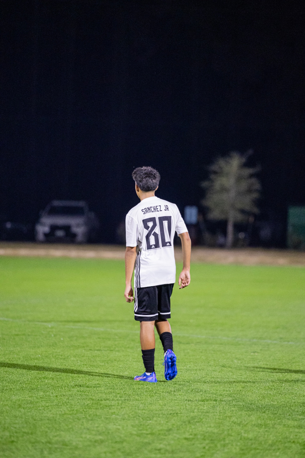 Eric walking away from camera in Volt League